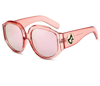 Oversize round sunglasses for women with olive frames, dark gradient lenses, and a gold emblem on the temples. - Image 11