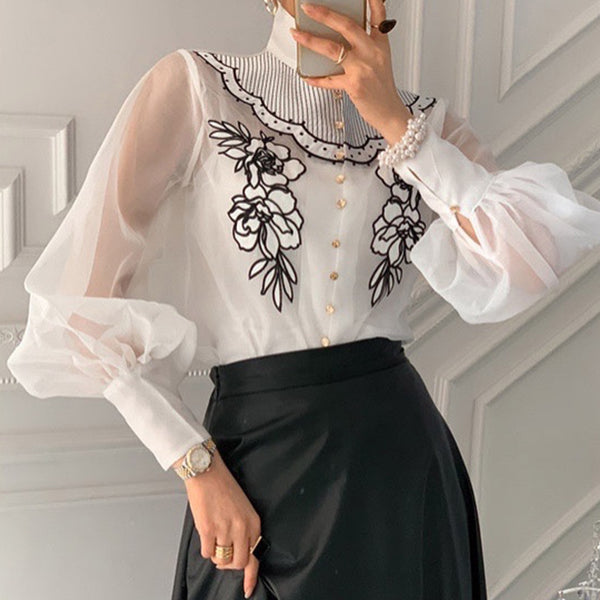 Blusa Elegante con Mangas Linterna y Flores Bordadas