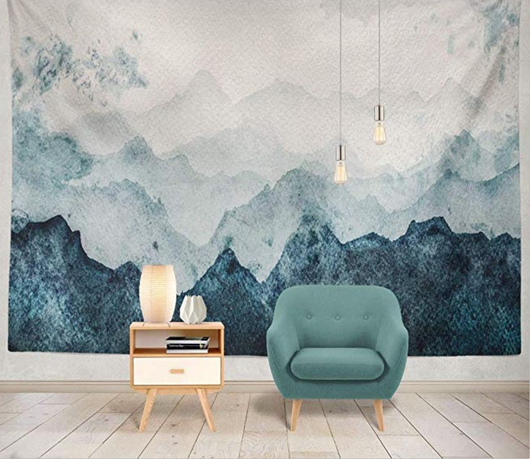 Digital printing tapestry featuring a watercolor mountain landscape in shades of blue and grey, hanging on a wall. - Image 2