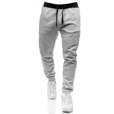 Pantalones Deportivos Holgados de Colores Sólidos para Hombre - Image 13