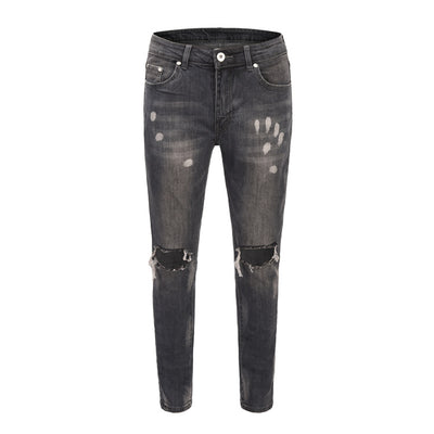 Jeans Slim Fit Azul con Corte en Rodilla y Diseño Spray Pintado - Image 24