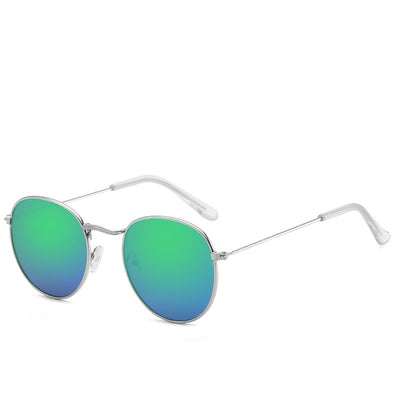 Round gold-framed sunglasses with pink tinted lenses, featuring clear temple tips. - Image 23