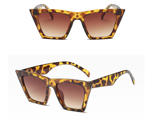 Transparent nude cat-eye sunglasses with brown gradient lenses, featuring a vintage 90s fashion style for women. - Image 12