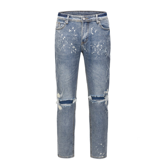 Jeans Azul Claro con Efecto Salpicado y Rotos Desgastados