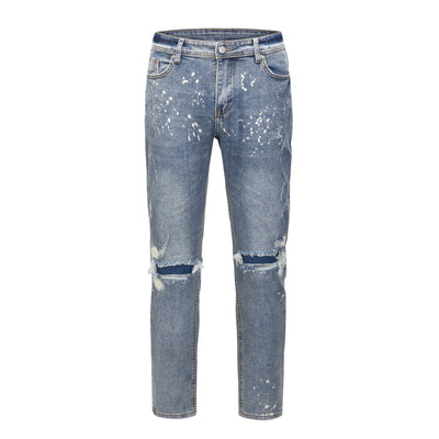Jeans Azul Claro con Efecto Salpicado y Rotos Desgastados