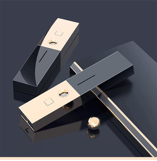 Two sleek black and gold nano spray water replenishing instruments on a dark, reflective surface. - Image 14