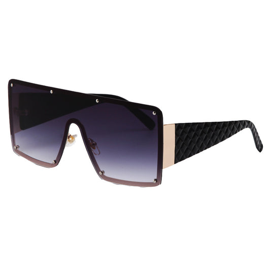Oversized square frame sunglasses with brown gradient lenses and tortoise shell arms featuring a textured diamond pattern.