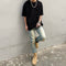 Jeans Slim Fit Desgastados con Efecto Vintage Amarillento