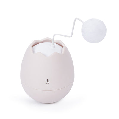 White egg-shaped automatic cat toy with a yellow interior and a flexible wire holding a yellow fuzzy ball. - Image 7