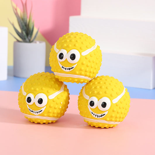 Yellow textured latex pet ball with a cartoon face, designed as a sounding dog toy for teeth cleaning. - Image 7