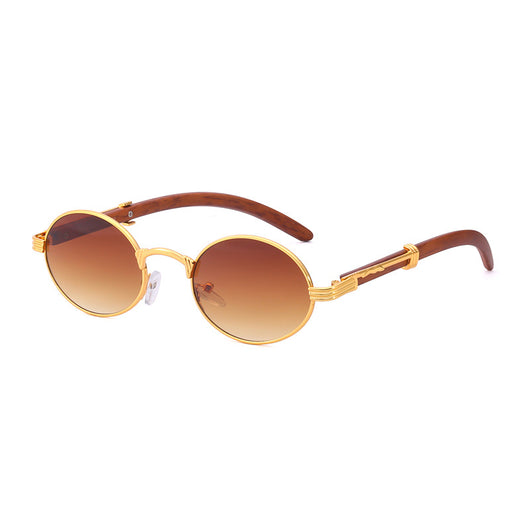 Retro oval sunglasses with gold metal frames and dark wood-like temples, featuring gradient black lenses. - Image 12