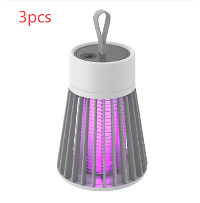 White and grey electric mosquito killer lamp with a purple UV light, featuring a conical cage and top handle. - Image 9