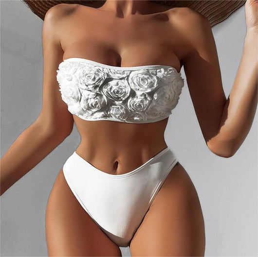 White tube top bikini swimsuit with 3D floral appliques and high-waisted bottom, modeled on a person. - Image 7
