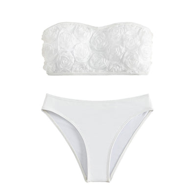 White tube top bikini swimsuit with 3D floral appliques and high-waisted bottom, modeled on a person. - Image 8