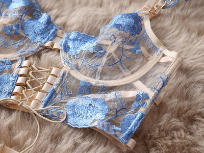 Light blue and beige embroidered sheer push-up bra set with floral lace, matching thong, garter straps, and mini skirt. - Image 30