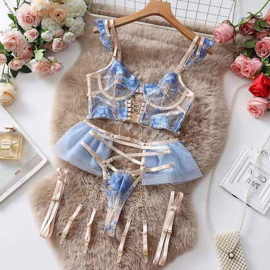 Light blue and beige embroidered sheer push-up bra set with floral lace, matching thong, garter straps, and mini skirt. - Image 33