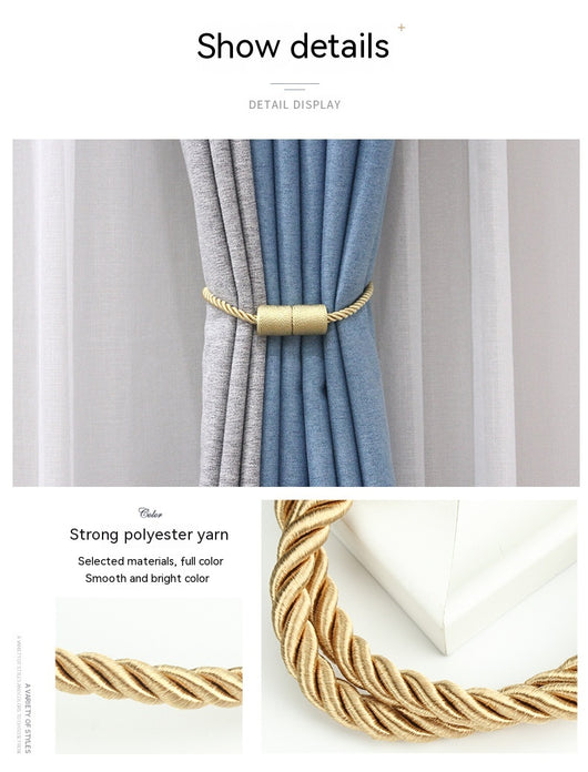Black cylindrical magnetic curtain tieback holding a light blue pleated curtain, against a clean white background. - Image 26
