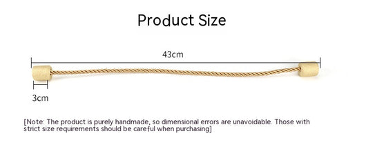 Black cylindrical magnetic curtain tieback holding a light blue pleated curtain, against a clean white background. - Image 27