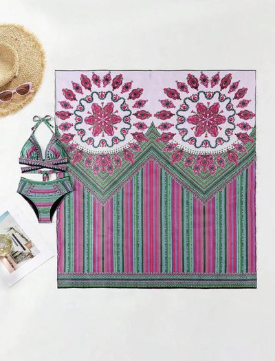 Women's three-piece bikini set with a colorful striped and geometric pattern, featuring a halter top, high-waisted bottoms, and a matching sheer cover-up, on a - Image 40