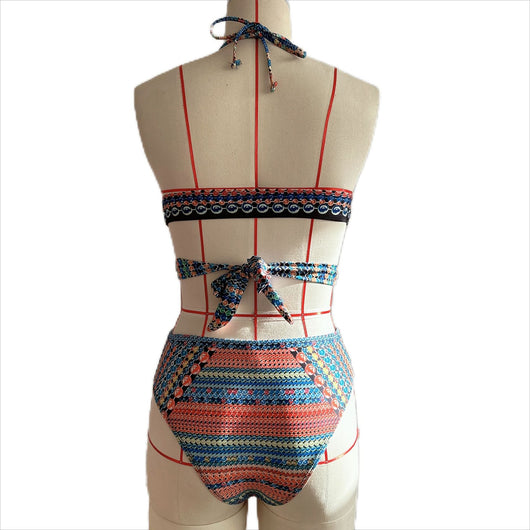 Women's three-piece bikini set with a colorful striped and geometric pattern, featuring a halter top, high-waisted bottoms, and a matching sheer cover-up, on a - Image 52