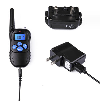 Black remote control dog trainer with blue LCD screen, alongside one black and one orange training collar. - Image 10