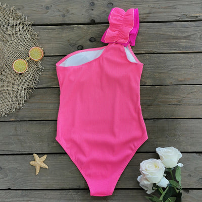 Black one-shoulder ribbed one-piece swimsuit with a ruffled blue and black strap, ideal for women's swimwear. - Image 46