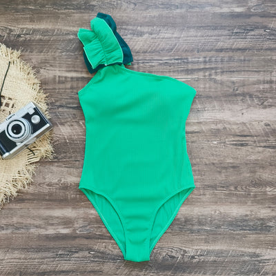 Black one-shoulder ribbed one-piece swimsuit with a ruffled blue and black strap, ideal for women's swimwear. - Image 74