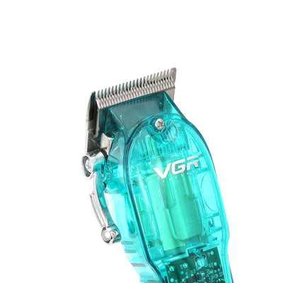 Transparent teal rechargeable hair clipper with digital display, four guide combs, cleaning brush, oil, and charging cable. - Image 19