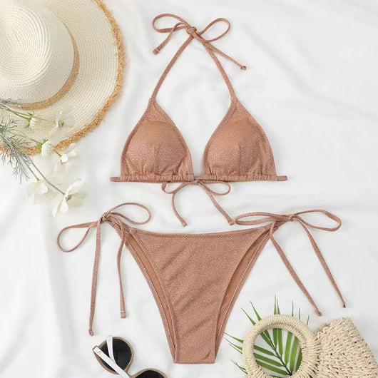 Shimmery blue two-piece bikini swimsuit with a triangle halter top and matching tie-side brief bottoms. - Image 13
