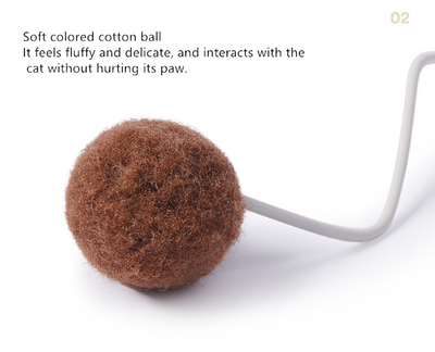 White egg-shaped automatic cat toy with a yellow interior and a flexible wire holding a yellow fuzzy ball. - Image 19