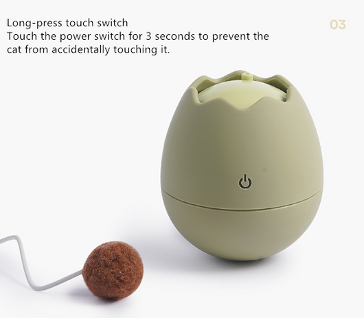 White egg-shaped automatic cat toy with a yellow interior and a flexible wire holding a yellow fuzzy ball. - Image 20