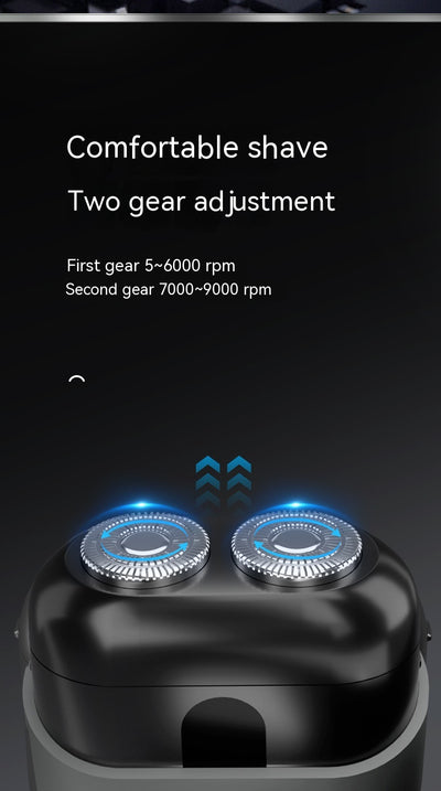 Silver mini electric shaver with a double-headed rotary design and a black power button on top. - Image 30