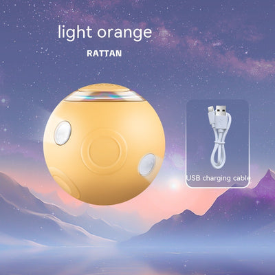Sakura pink smart pet ball with automatic obstacle avoidance and luminous rotation, shown with its USB charging cable. - Image 8