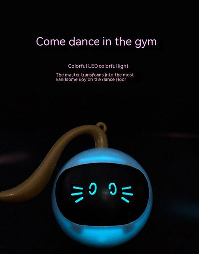 Yellow electric cat toy ball with a black face, glowing blue eyes and whiskers, and a grey tail attachment. - Image 28