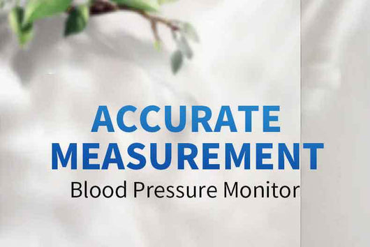 White electronic arm blood pressure monitor with large digital display and dark blue cuff, next to its product box. - Image 29