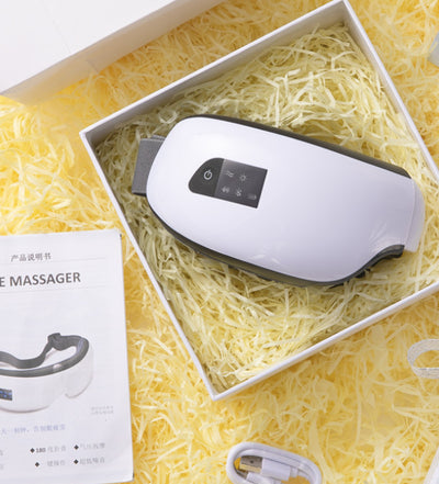 White Bluetooth music eye massager with control panel, air pressure, and hot compress functions in a gift box. - Image 39