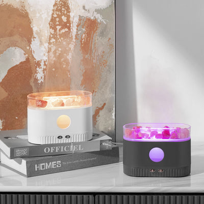 Black desktop humidifier with clear top filled with pink Himalayan salt rocks and rose gold control buttons. - Image 9