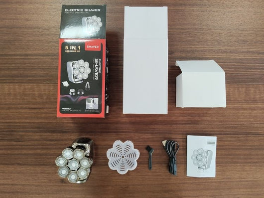 New digital electric shaver with eight rotary blades in a metallic silver finish, designed for a close shave. - Image 8