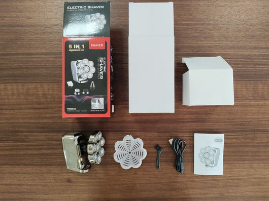 New digital electric shaver with eight rotary blades in a metallic silver finish, designed for a close shave. - Image 16