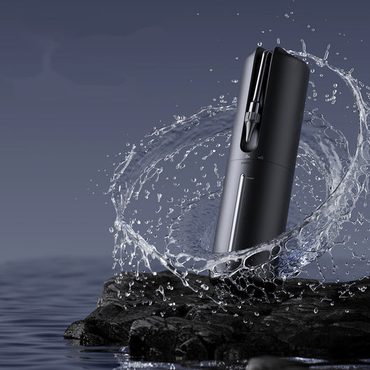 Black electric ear wax remover kit with main device, measuring cup, 10 nozzles, and USB-C charging cable. - Image 7