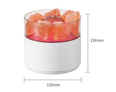 White cool-mist humidifier and aroma diffuser with glowing blue LED lights and orange crystal salt rocks, emitting mist. - Image 24