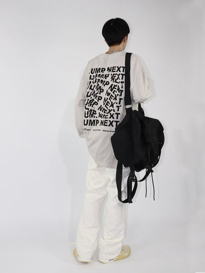 Playera Unisex Manga Larga Cuello Redondo Estampado Vórtice de Letras - Image 9