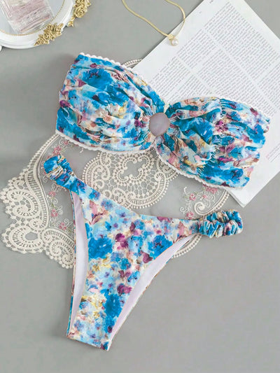 Floral print tube top bikini with blue and purple flowers, white lace trim, and a central ring detail. - Image 19