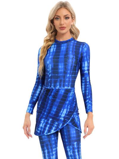 Blue tie-dye conservative beach swimsuit with long sleeves, full-length leggings, and a sheer sarong-style skirt. - Image 33