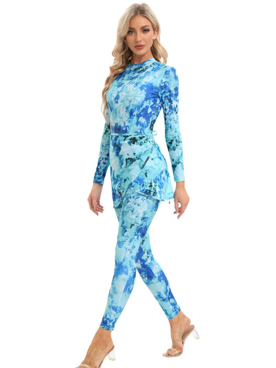 Blue tie-dye conservative beach swimsuit with long sleeves, full-length leggings, and a sheer sarong-style skirt. - Image 47