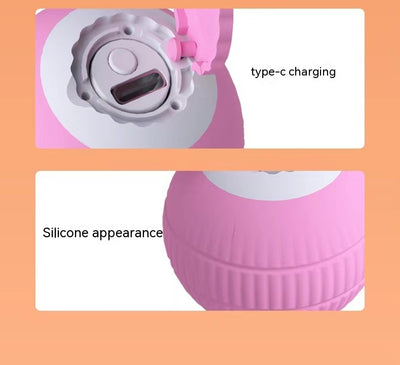 Pink gravity rolling cat teasing ball with a power button, designed to entertain and engage cats. - Image 13