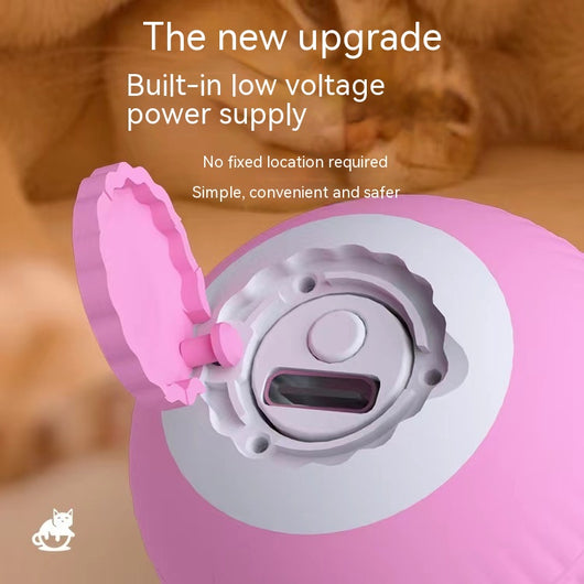 Pink gravity rolling cat teasing ball with a power button, designed to entertain and engage cats. - Image 18