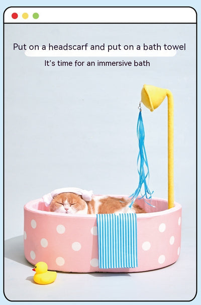 Pink polka dot pet bed shaped like a bathtub with a yellow showerhead toy and blue streamers, plus a blue striped 'towel'. - Image 15