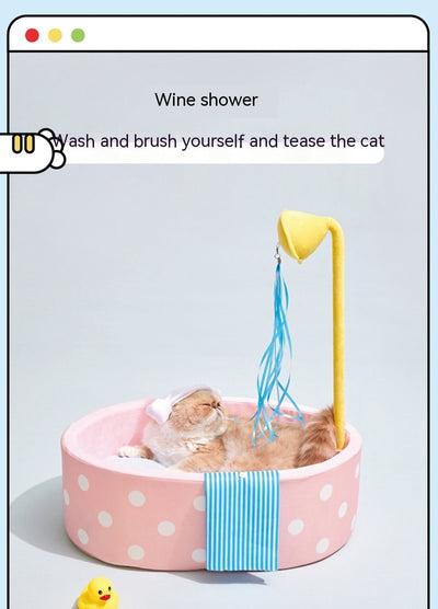 Pink polka dot pet bed shaped like a bathtub with a yellow showerhead toy and blue streamers, plus a blue striped 'towel'. - Image 20