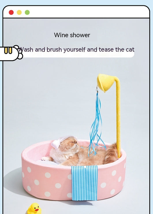 Pink polka dot pet bed shaped like a bathtub with a yellow showerhead toy and blue streamers, plus a blue striped 'towel'. - Image 20